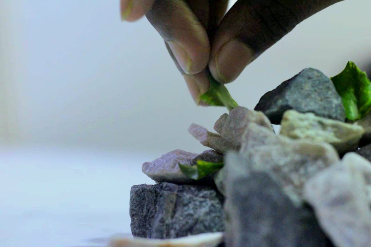 Hand inspecting fabric texture